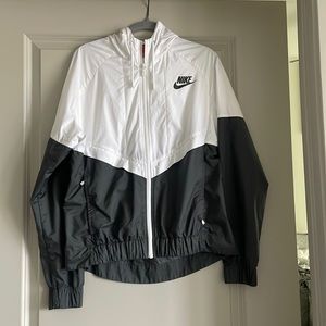 White and grey Nike windbreaker